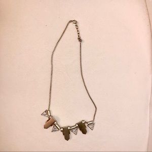 Gold necklace with white marble